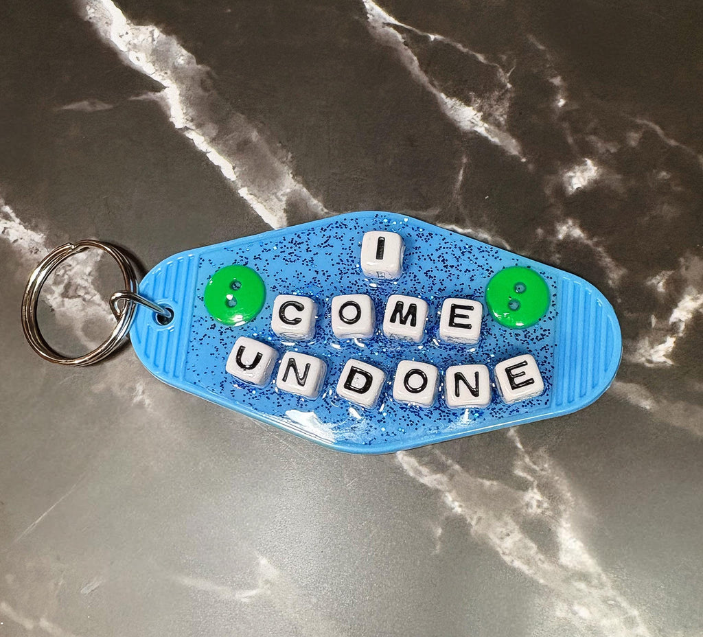 Blue ‘I come undone ‘ Keychain