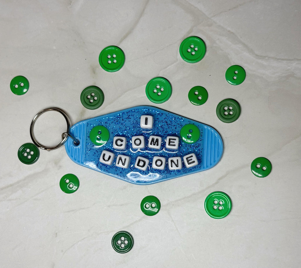 Blue ‘I come undone ‘ Keychain