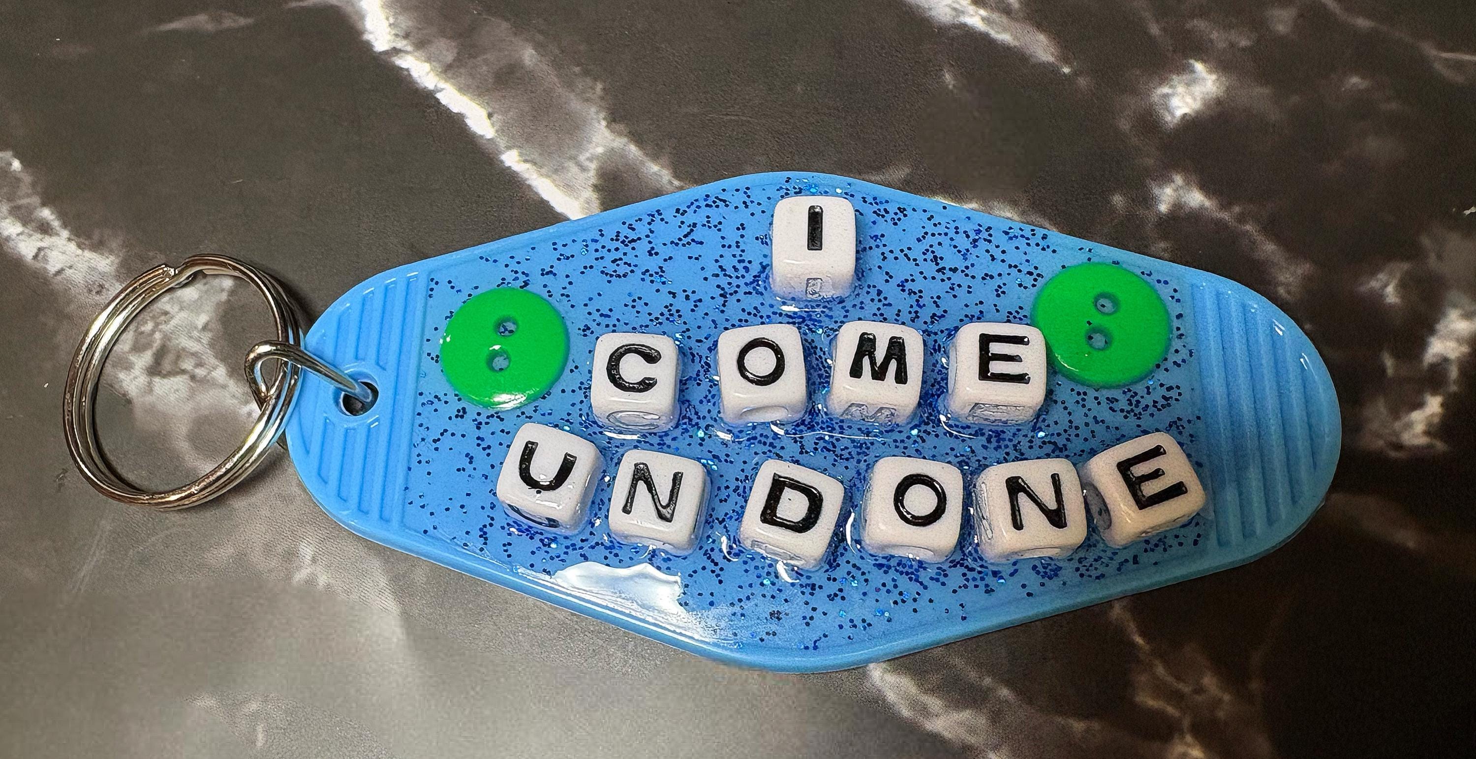 Blue ‘I come undone ‘ Keychain